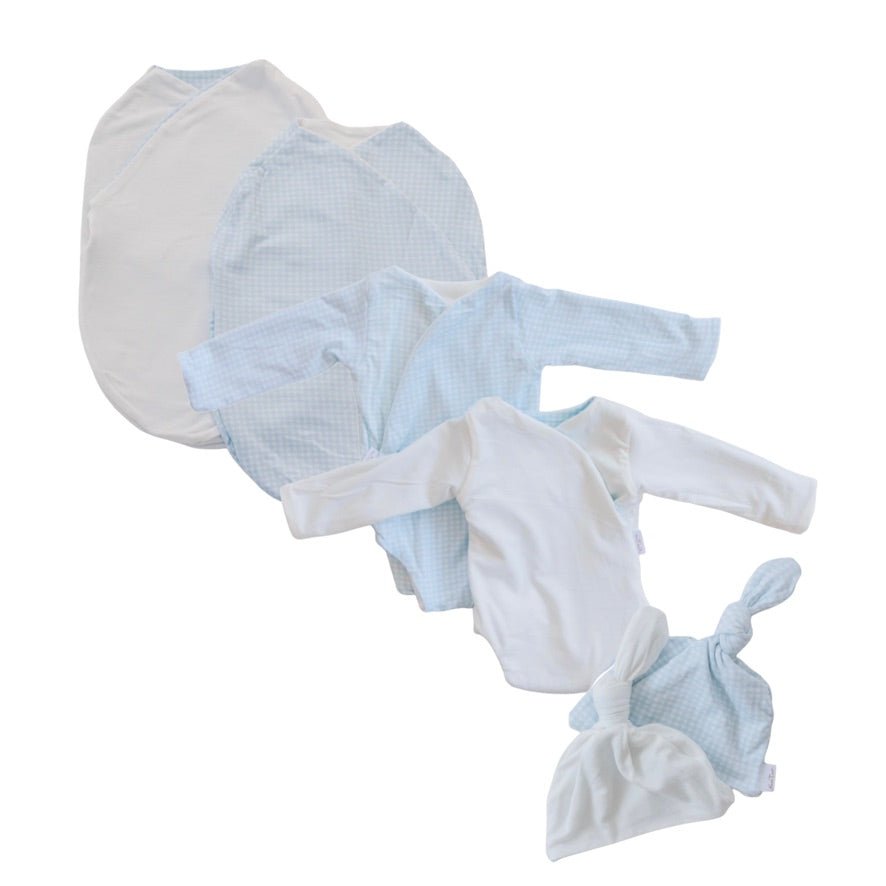 Newborn bundle with long sleeve essentials in silky modal fabric with baby blue gingham design.