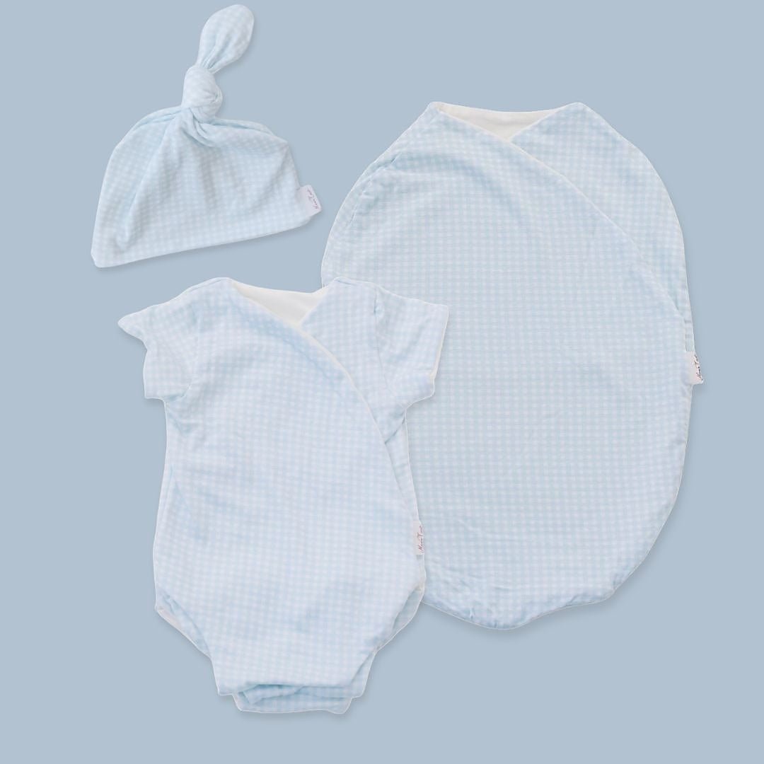 Short sleeve newborn essentials bundle in silky modal fabric with baby blue gingham design.