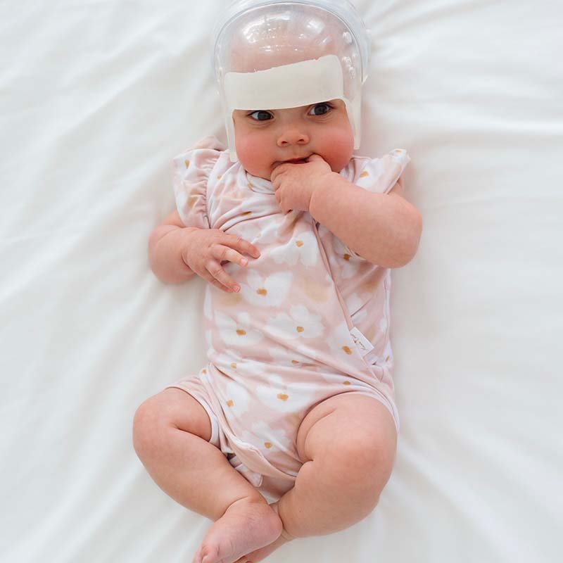 Sweet Lily baby bodysuit with short sleeves crafted in soft Classic Brushed fabric styles.
