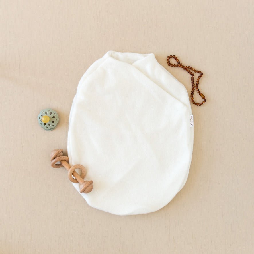 Reversible baby cocoon swaddle.