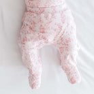 Baby footie pants in whimsical garden design.