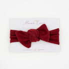 Headwrap with bow for baby in Plush Dark Cherry fabric styles.