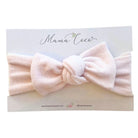 Headwrap with bow for baby in Plush Pink Cashmere fabric styles.