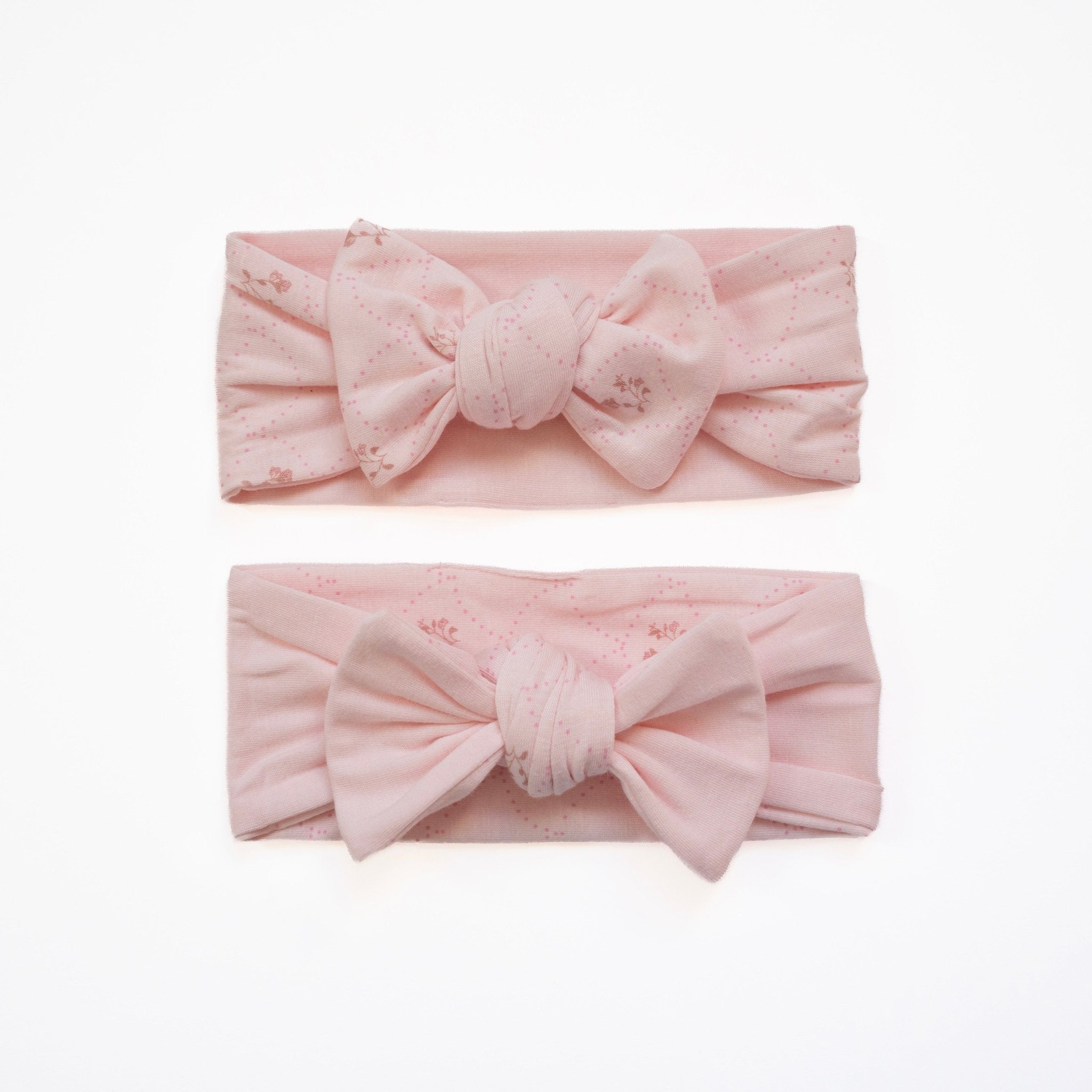 Headwrap with bow for babies made from bamboo organic cotton fabric, in dainty dots design.
