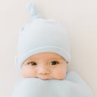 Knotty beanie for babies in Plush Powder Blue design, made from Plush Dream fabric.