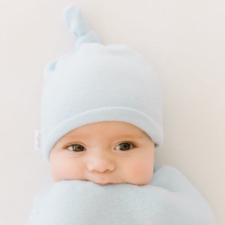 Knotty beanie for babies in Plush Powder Blue design, made from Plush Dream fabric.