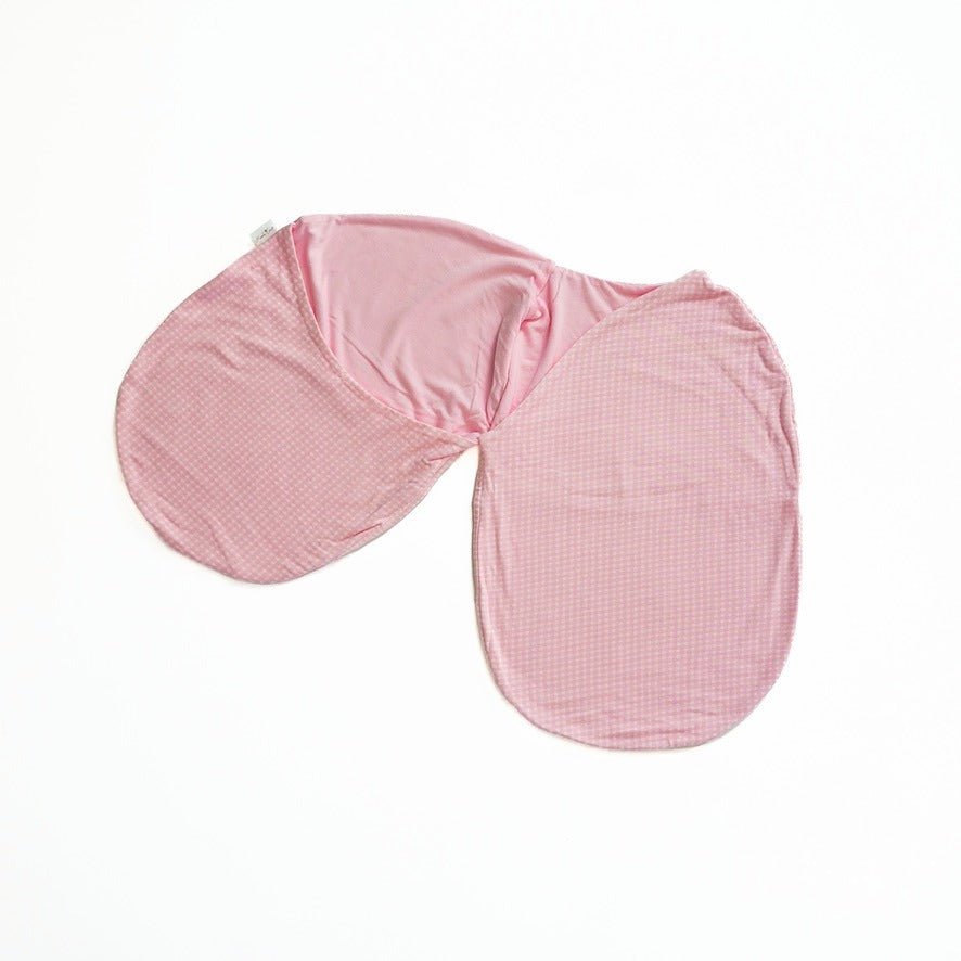 Elegant Baby Pink Gingham styling on a Cocoon swaddle blanket for infants in Silky Modal fabric styles.