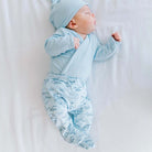 Cozy baby footie pants crafted from bamboo cotton in the bon voyage design.