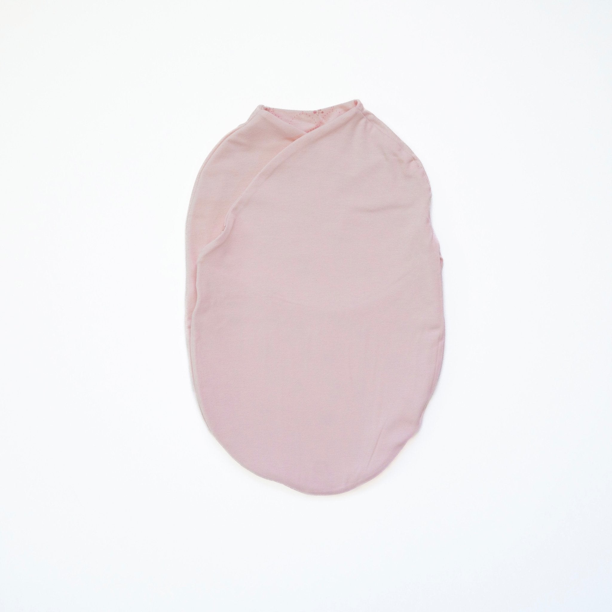 Reversible baby swaddle cocoon blanket crafted from bamboo and organic cotton fabric, decorated with Dainty Dots.