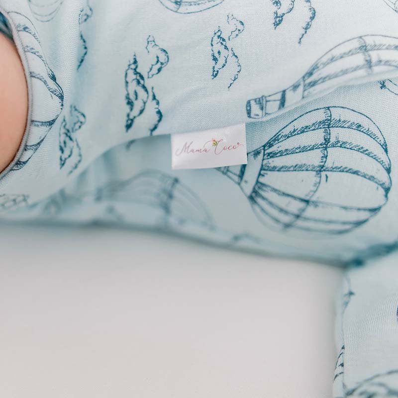 Long-sleeve winged bodysuit for babies.