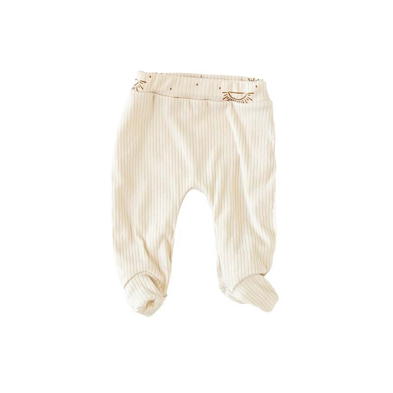 Reversible Sandy Sunsets baby footie pants made with breathable bamboo cotton fabric.