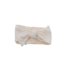 Soft and elegant headwrap with bow in Bitty Blooms design.