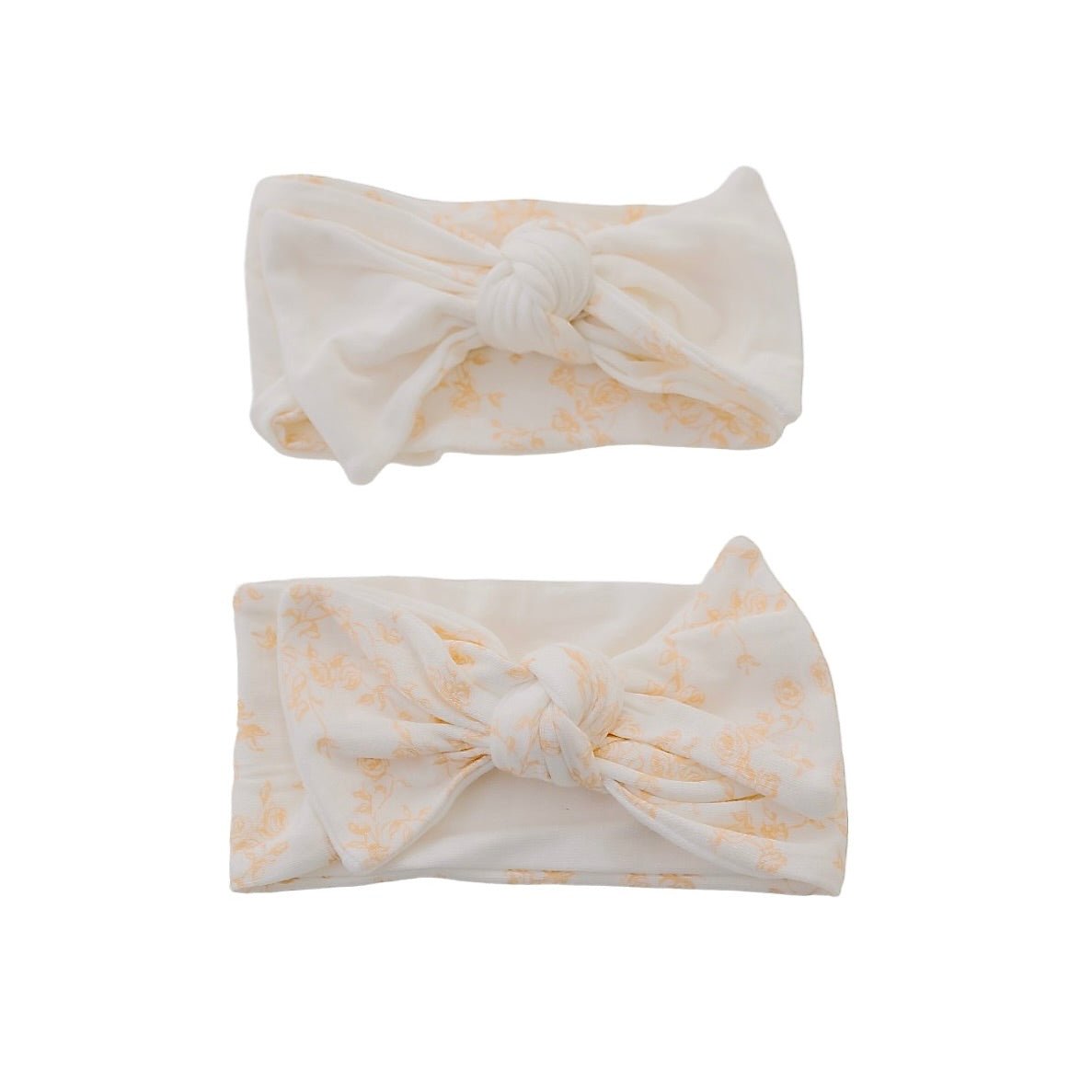 Cozy Bitty Blooms headwraps accented with a beautiful bow.