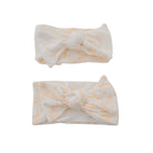 Cozy Bitty Blooms headwraps accented with a beautiful bow.