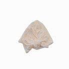 Bitty Blooms ruched beanie for babies, featuring a stylish bow detail.