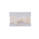Headwrap with bow crafted in soft Bitty Blooms design silky modal fabric.