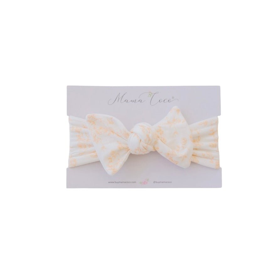 Headwrap with bow crafted in soft Bitty Blooms design silky modal fabric.