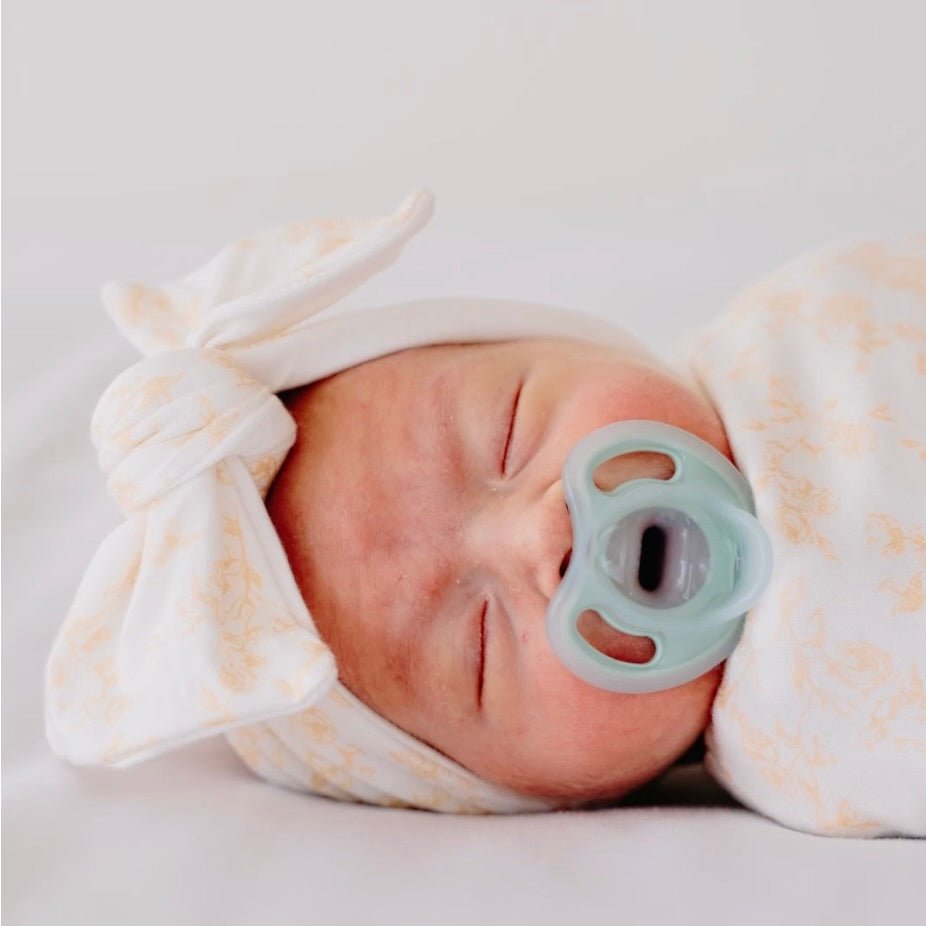 Adorable bow headwrap available in luxurious silky modal with Bitty Blooms design.