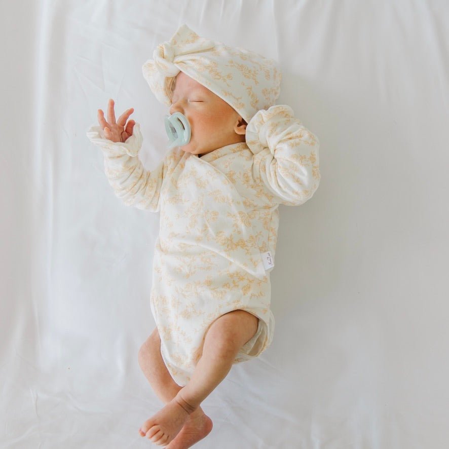 Bitty blooms design baby onesie outfit in silky modal fabric.