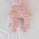 Bitty Pink Blooms baby footie pants made with breathable bamboo organic cotton fabric.
