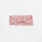 Cozy Bitty Pink Blooms headwrap accented with a beautiful bow.