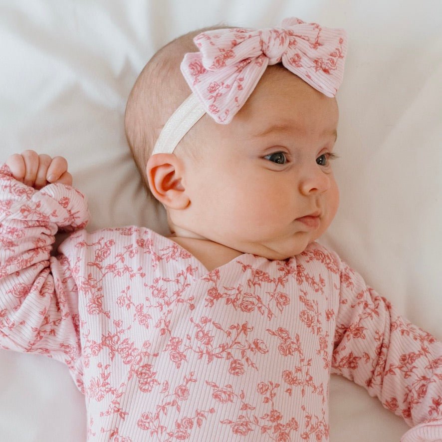 Flutter sleeve baby onesie outfit bundle made from silky modal fabric in bitty pink blooms design.