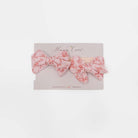 Headband and bow set crafted in soft Bitty Pink Blooms design silky modal fabric.