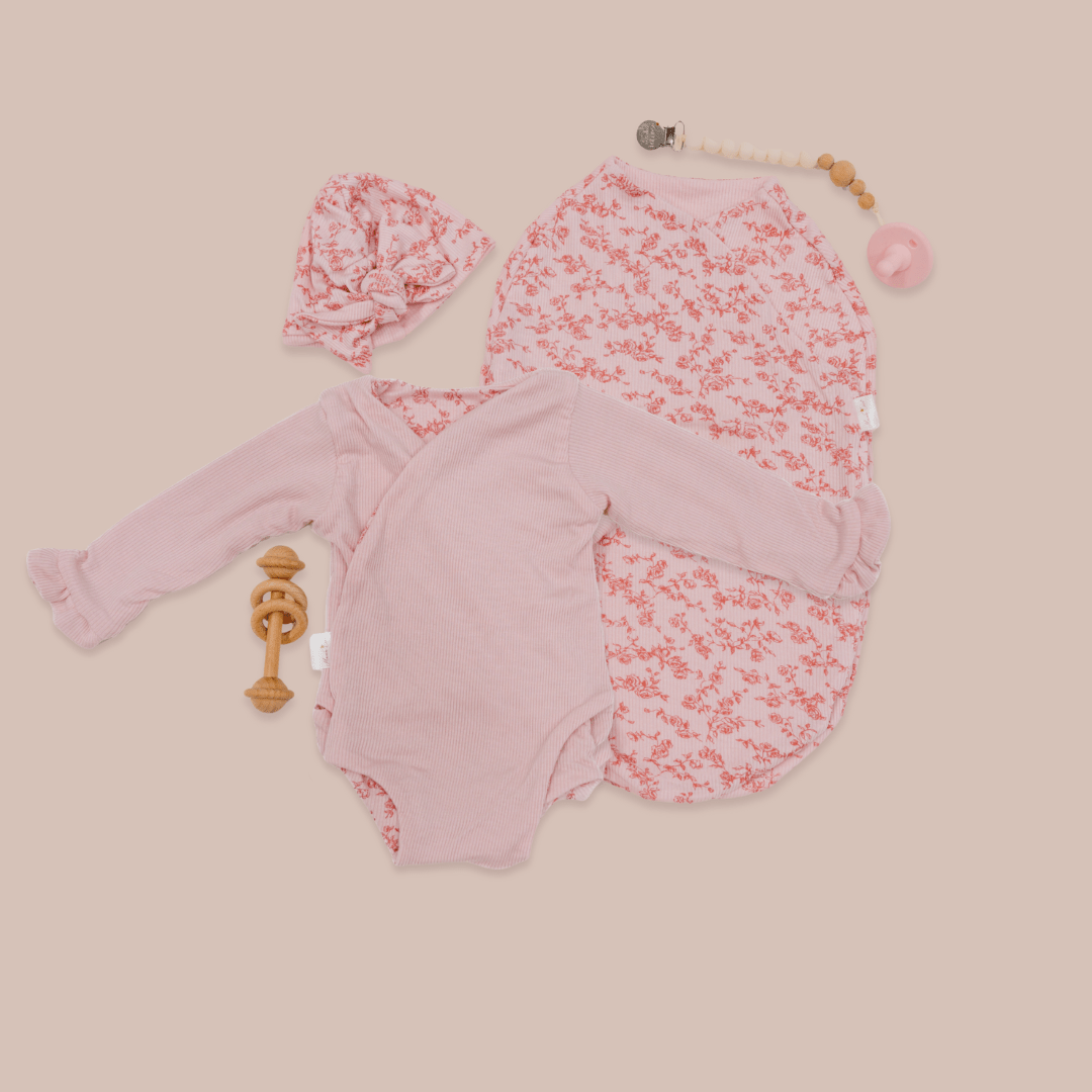 Silky modal long sleeve newborn baby bundle, featuring adorable ruffle cuffs in bitty pink blooms design.