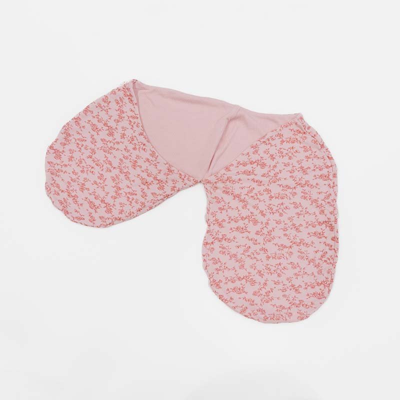 Delicate Bitty Pink Blooms artwork on a Cocoon swaddle baby blanket in Silky Modal fabric styles.