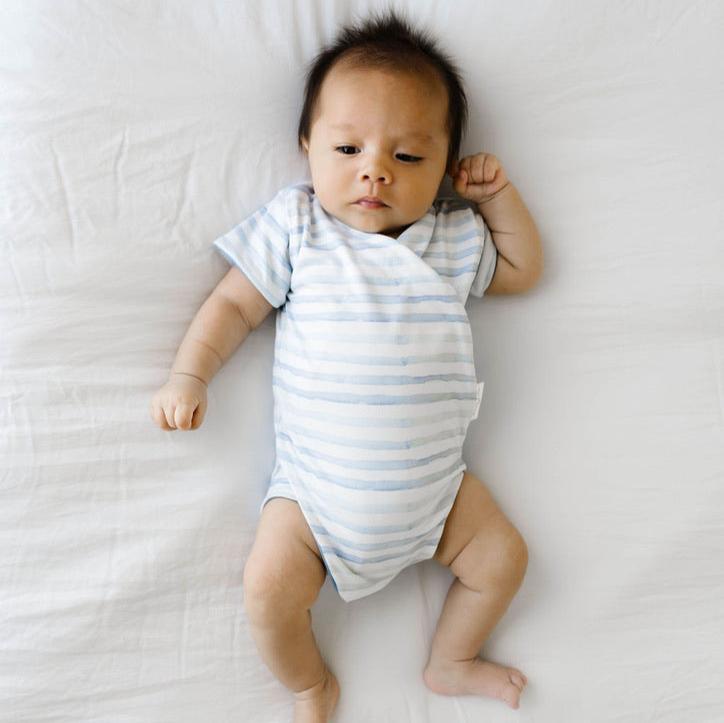 Chambray waves design short-sleeve baby onesie in classic brushed fabric.