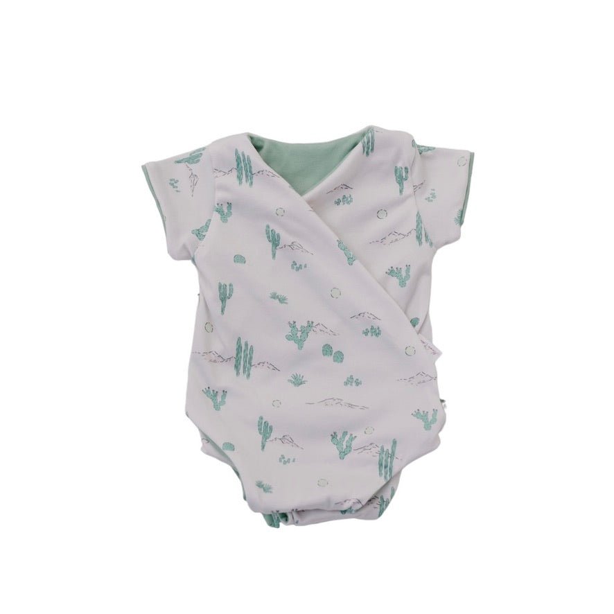 Comfortable short-sleeve winged bodysuit in Desert Sunsets with a soft classic brushed feel.