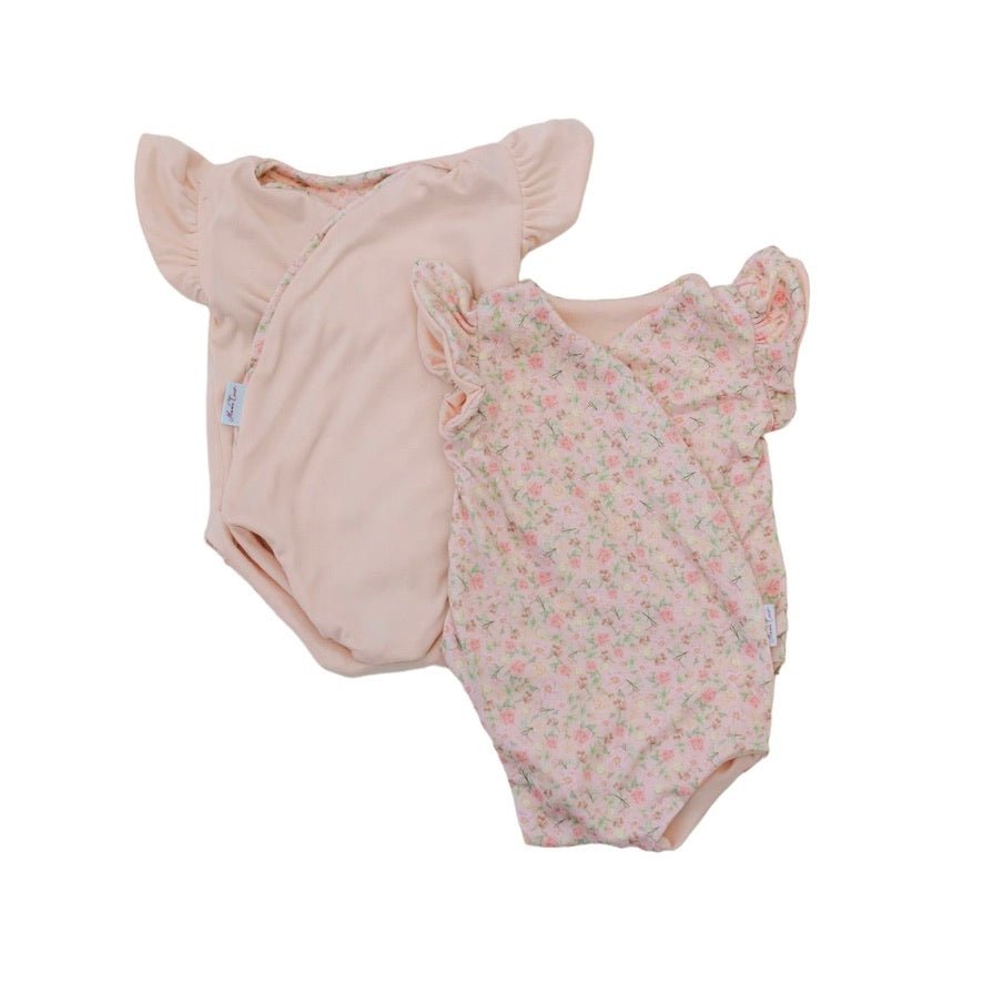 Reversible Dusty Roses baby bodysuit with short sleeves and a vintage floral design.