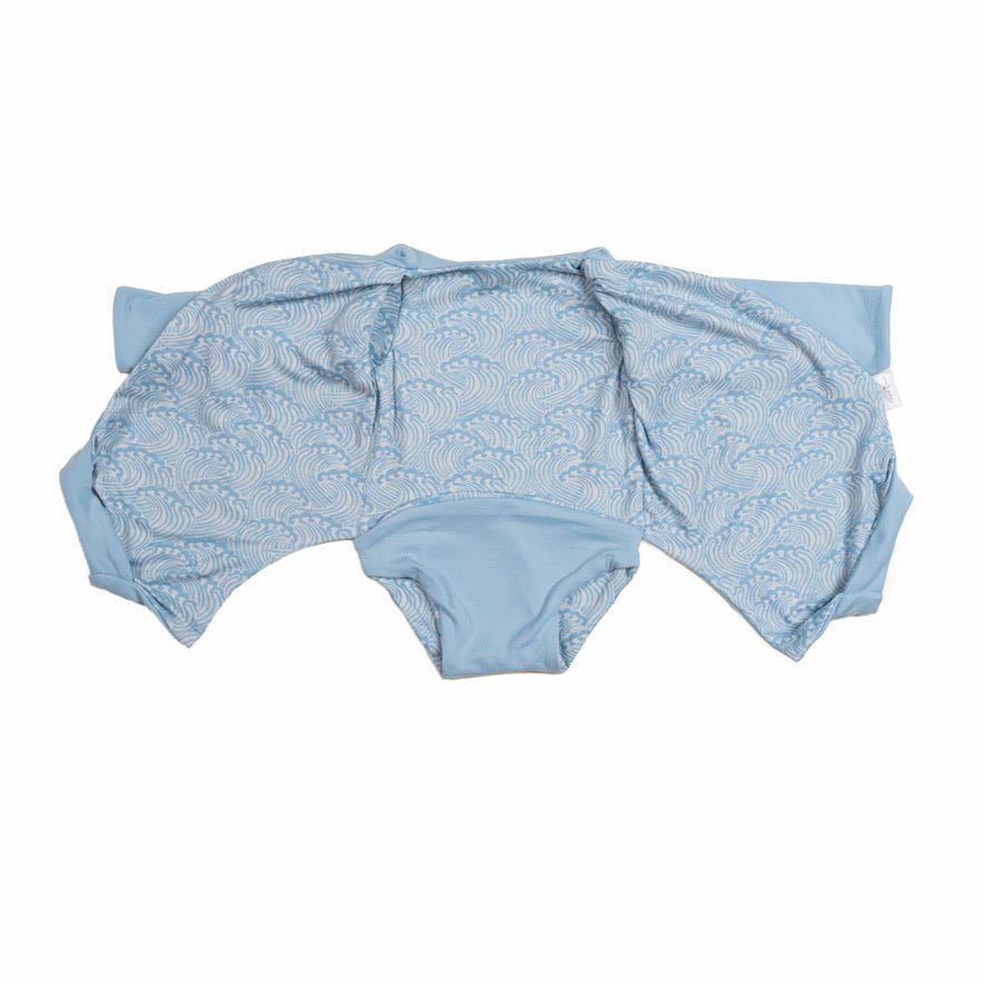 Classic brushed long sleeved baby winged bodysuit in Blue Swells design.