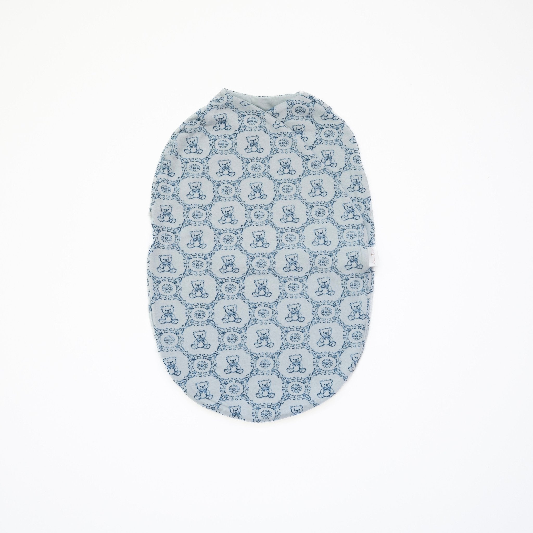 Cocoon style baby blanket bamboo cotton blend with Teddy Tiles design.