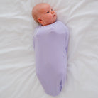 Cocoon swaddle baby blanket in Silky Modal fabric styles featuring the Purple Posies design.