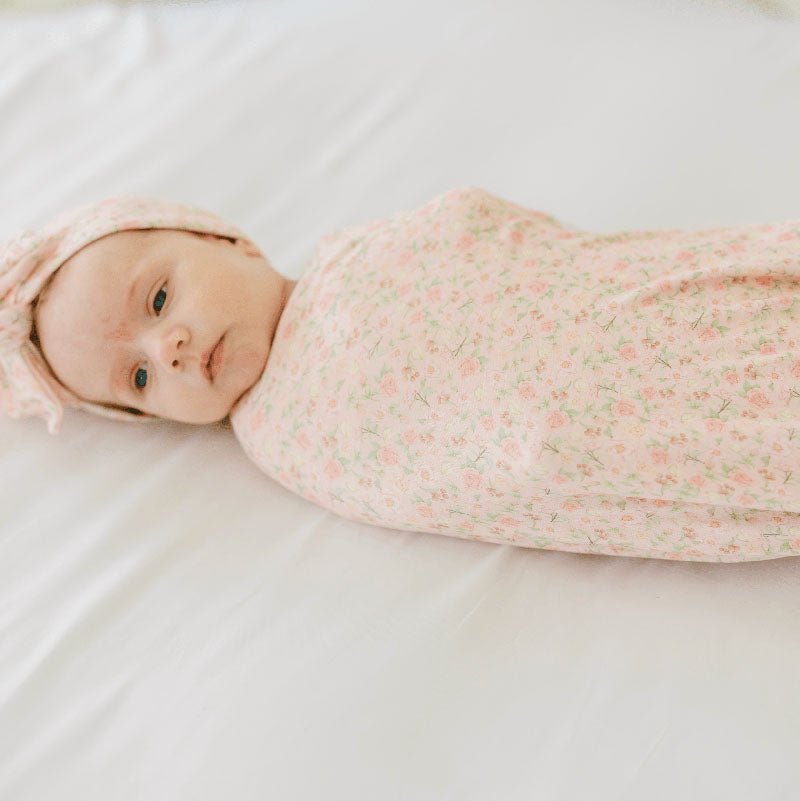 Premium baby cocoon swaddle crafted from Dusty Roses Silky Modal fabric.