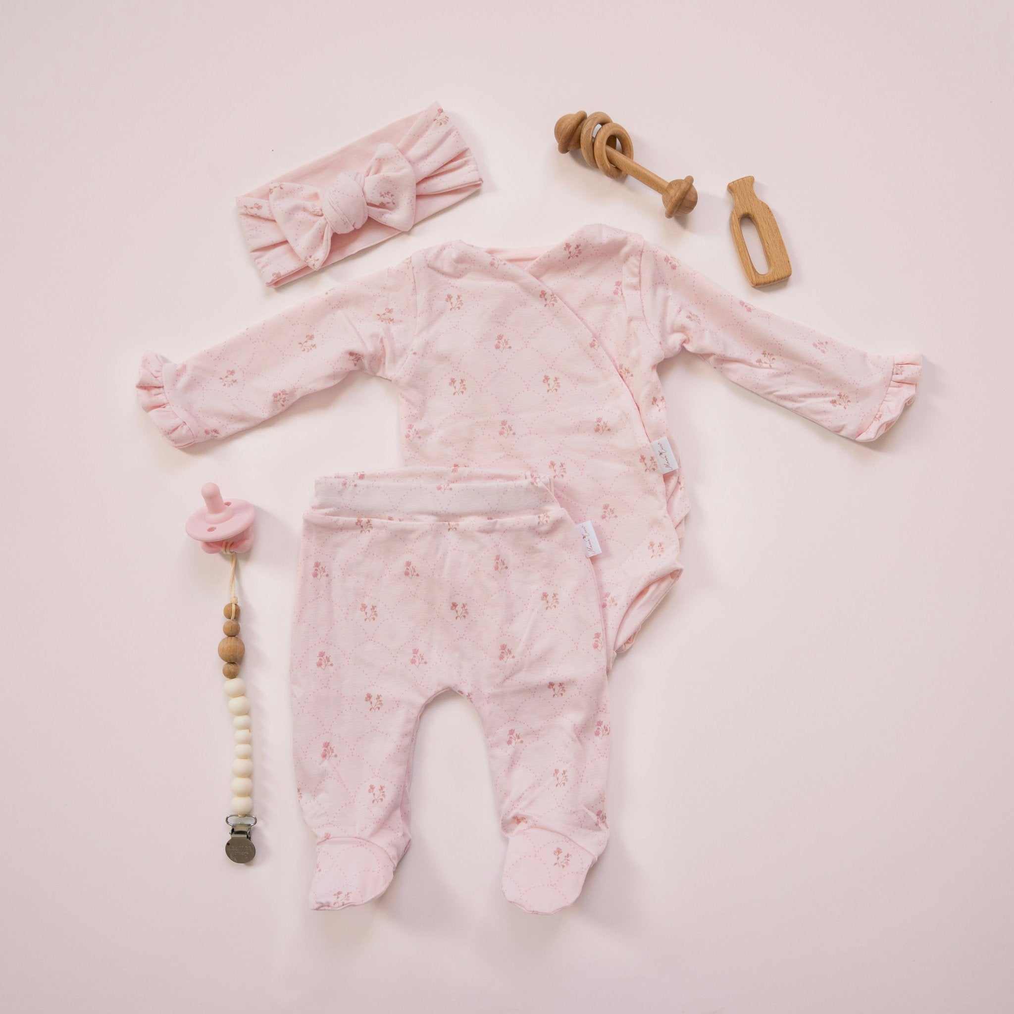 Ruffle cuff long sleeve baby onesie outfit bundle made from bamboo cotton in dainty dots design.