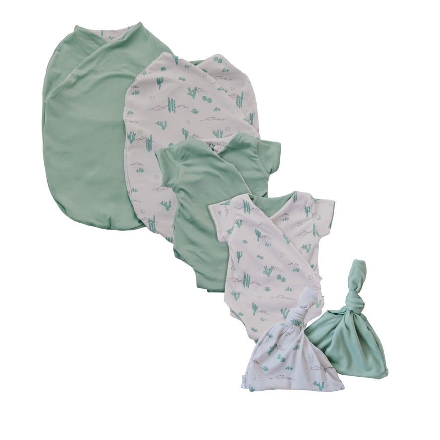 Newborn essentials bundle with short sleeves in classic brushed fabric with desert sunsets design.