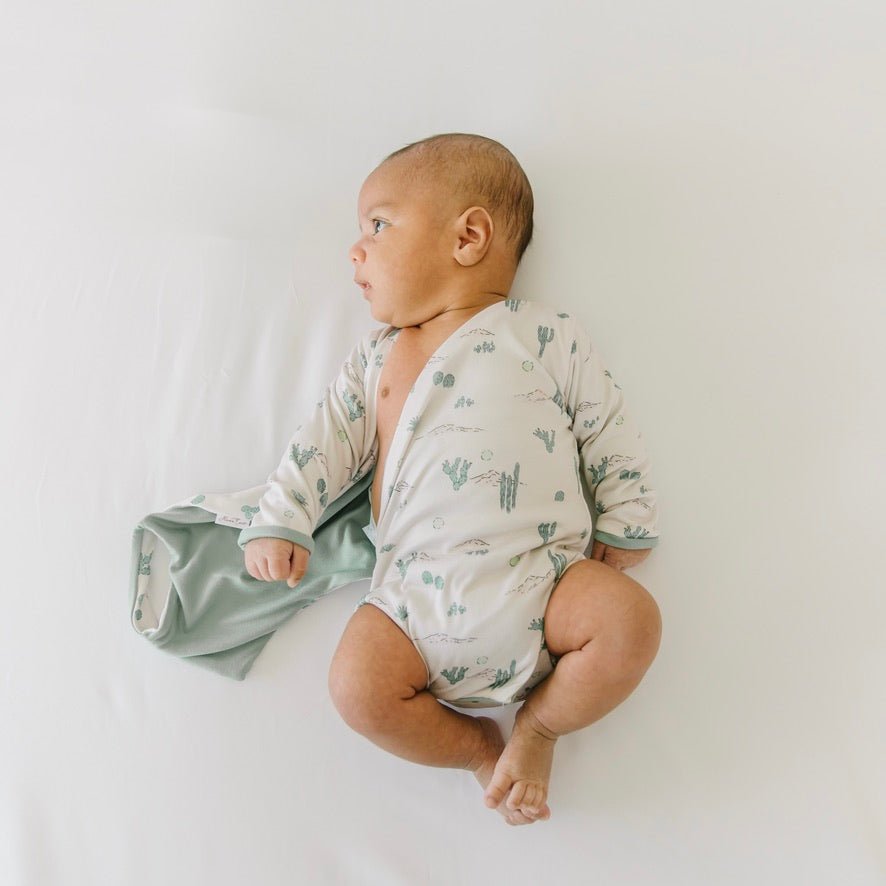 Desert Sunsets design baby winged bodysuit in classic brushed fabric.