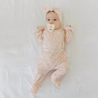Dusty Roses baby footie pants made with breathable bamboo cotton fabric.