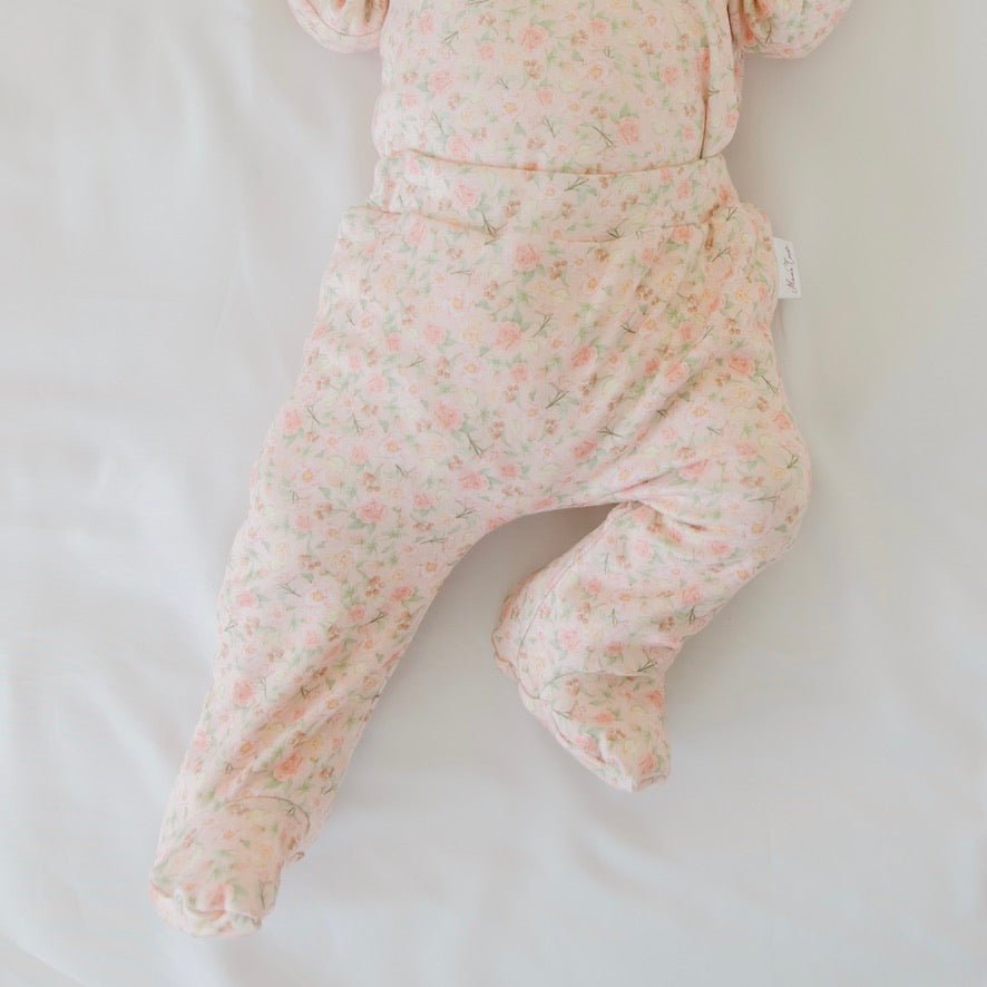 Dusty Roses baby footie pants made with breathable bamboo organic cotton fabric.