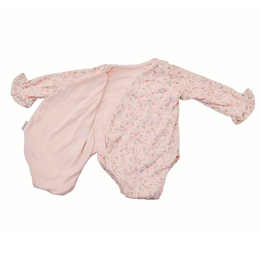 Baby long sleeve bodysuit in Dusty Roses design brushed fabric featuring wing details and ruffle cuffs.