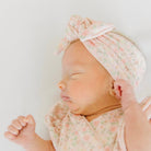 Dusty Roses headwrap for babies, featuring a stylish bow detail.