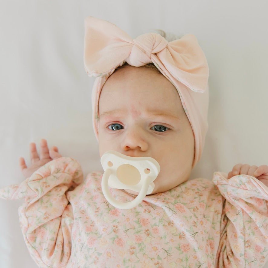 Headwrap with bow crafted in soft Dusty Roses design classic brushed fabric.