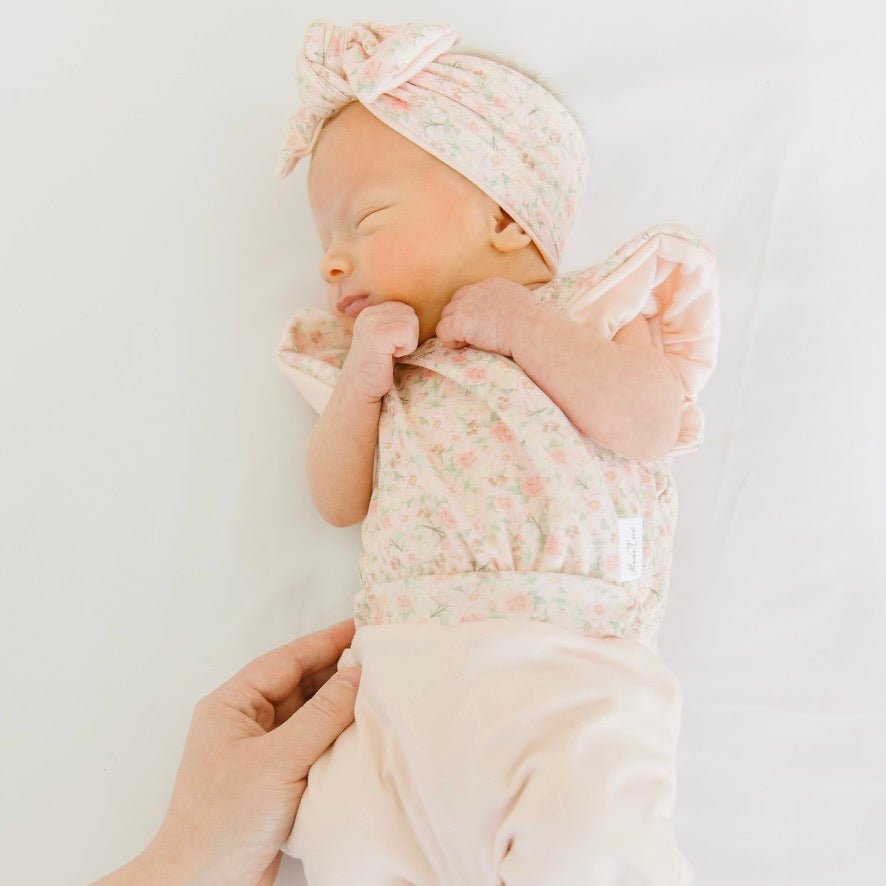 Dusty Roses short-sleeve bodysuit for baby in Classic Brushed fabric styles with a vintage floral print.