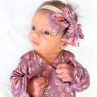 Peachy Lilac baby headband with bow crafted in cozy Classic Brushed fabric styles.