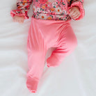 Comfortable baby footie pants made with bamboo cotton and finished in the Flower Power design.