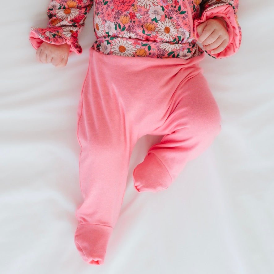 Comfortable baby footie pants made with bamboo cotton and finished in the Flower Power design.