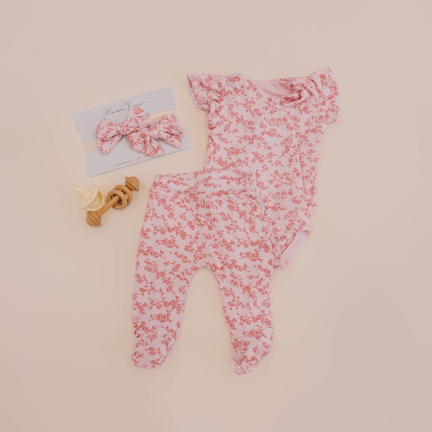 Flutter sleeve baby onesie outfit bundle made from silky modal fabric in bitty pink blooms design.