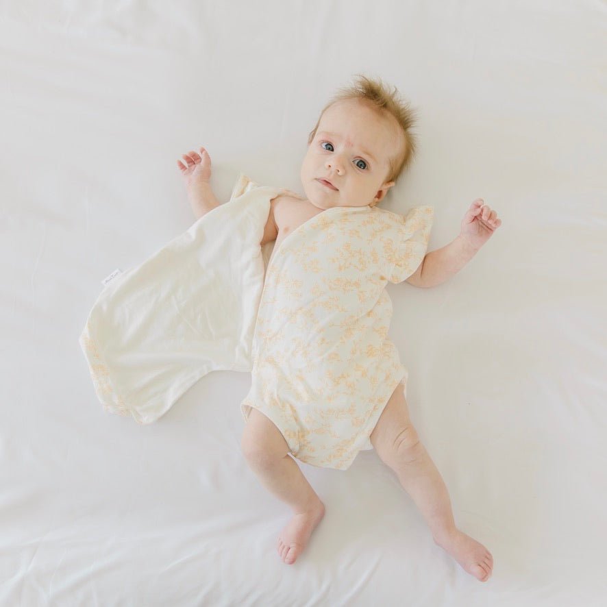 Flutter sleeve baby onesie in Bitty Blooms design.